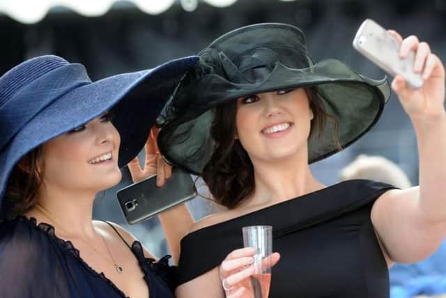 Ladies enjoy St Leger festival.