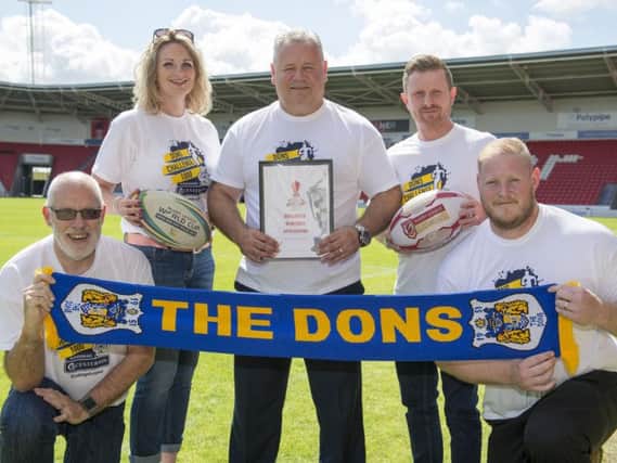 Chris Dungworth (Business Doncaster), Lorna Reeve (visit Doncaster ), Carl Hall (Doncaster RLFC), Dean Wiffen (Doncaster council), Ben Lewis (keepmoat stadium) with the Rugby League World Cup bid. PIcture: Dean Atkins