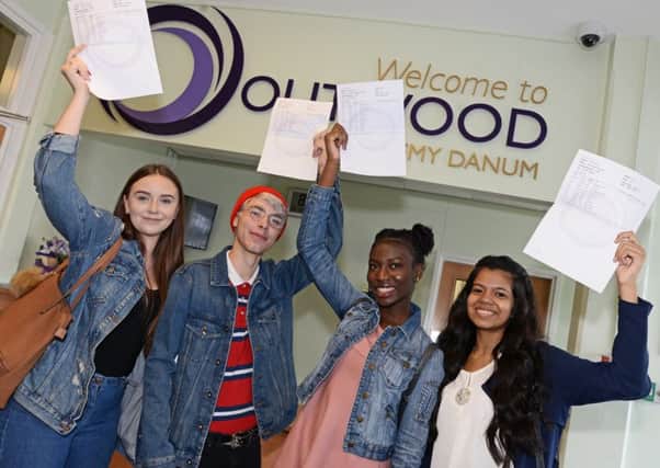 Celebrating their GCSE results at Outwood Academy Danum are l-r Lucy Truster, 16, of Wheatley, Rhys Knox, 16,of Balby, both are heading to New College to study A levels, Ayomide Oduyebo, 16, of Wheatley, will continue her studies at Hall Cross and Charmithaa Balendran, 16, of Wheatley, who gained eight 9's and three eight grades and is also going to Hall Cross to study for her A Levels  Picture: Marie Caley NDFP-23-08-18-GCSEDanum-2