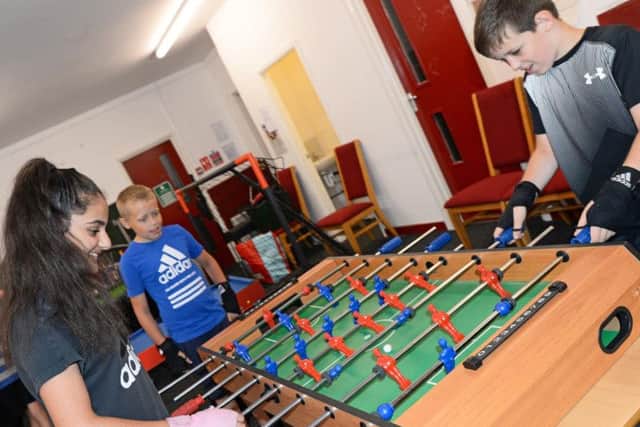 Maheen Ahmad, ten, Kian Hamilton, ten, pictured with others in the Springboard Youth Club. Picture: Marie Caley
