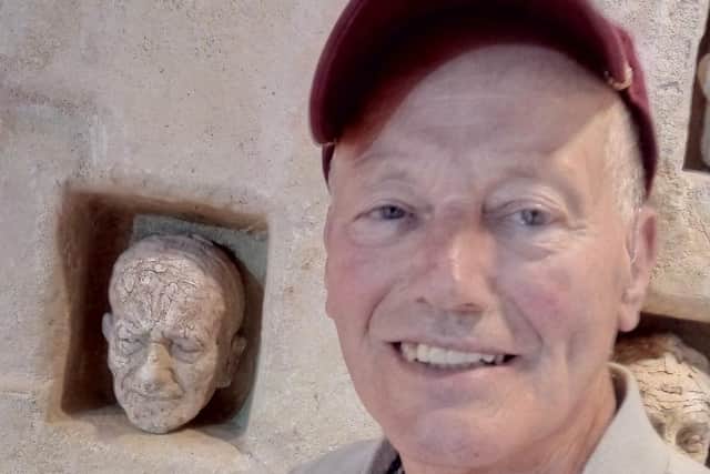 Former miner Dennis Nowell, of Armthorpe, next to the model of the proposed Doncaster miners memorial. His A sculpture of his face is to the left. Picture: David Kessen