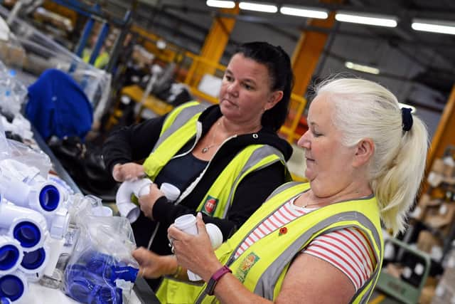 Doona Edwards and Denise Grove, pictured on the Undersink Trap assembly line. Picture: Marie Caley NDFP-28-08-18-Polypipe-4