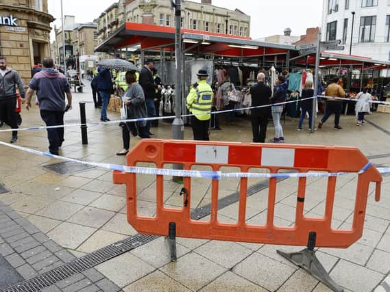 Police cordon off sections of Barnsley town centre after a stabbing.