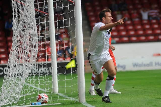 Chris Brown scores for Rovers in a 3-0 win at Walsall in 2012.