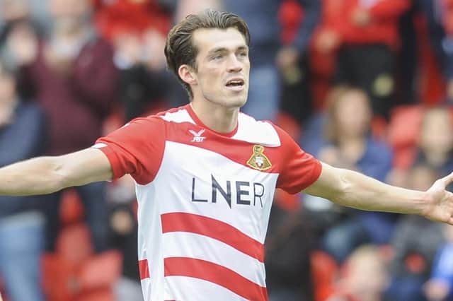 John Marquis celebrates scoring against Bradford City.