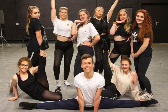 Daniel Harrison (front) with the musical theatre students.