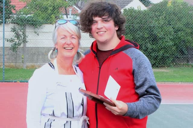 Ed Sutton receives his trophy from tournament sponsor Turner's Funeral Service, Conisbrough