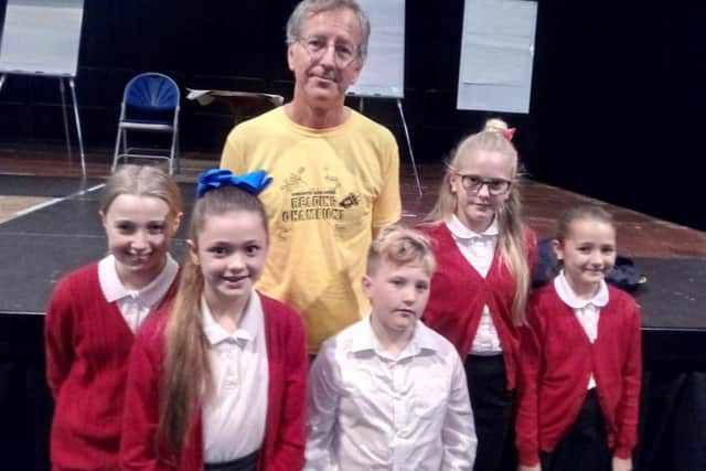 Horrible Histories illustrator Martin Brown with pupils from Adwick Primary School, at the Doncaster Book Awards launch, 2018-19, at the Dome