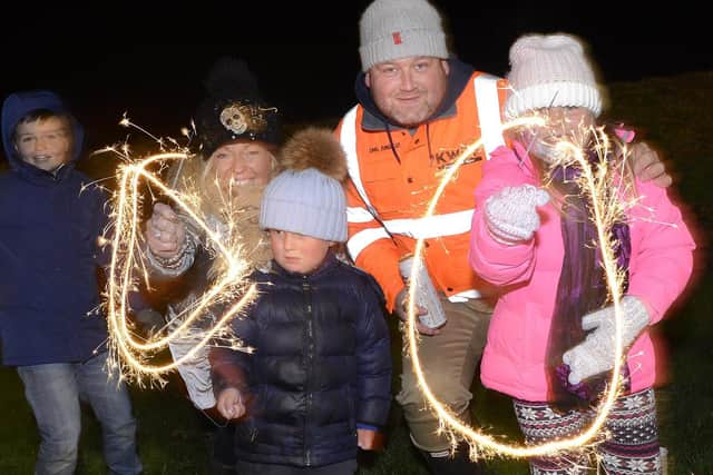 A family safely enjoying bonfire night fireworks. Picture by Jane Coltman, JP