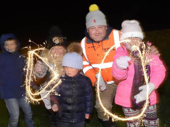 A family safely enjoying bonfire night fireworks. Picture by Jane Coltman, JP