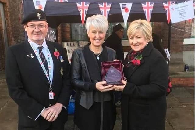 Window display winner Axholme Decorators receiving the prize from Cllr Denise Janney Vice Chairman of Epworth Town Council;