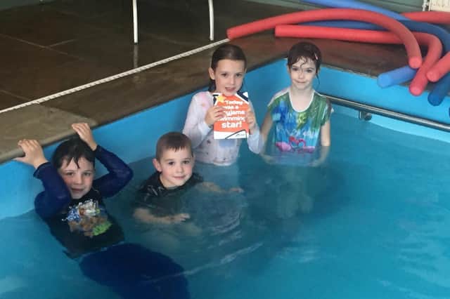 Little swimmers raise a pool of cash for local charity