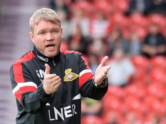 Doncaster Rovers manager Grant McCann has revealed he spoke to Barnsley before joining the club