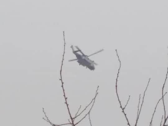 HM Coastguard over the scene