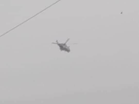 HM Coastguard over the scene