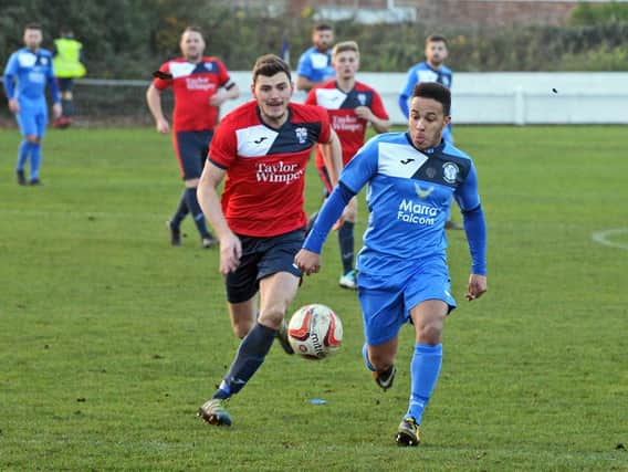 Armthorpe Welfare v Rossington Main. Rossington's Robert Ludlan and Armthorpe's Luke Williams, pictured. Picture: Marie Caley NDFP-24-11-18-ArmthorpevRossington-4