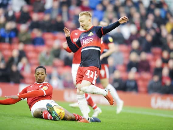 Ali Crawford is halted by Barnsley's Ethan Pinnock