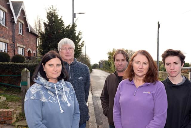 Long Sandall residents Donna Ward and husband Mick Hirst, Andrew and Rachel Hill and their son Jack, 13, pictured on Clay Lane West.