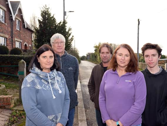 Long Sandall residents Donna Ward and husband Mick Hirst, Andrew and Rachel Hill and their son Jack, 13, pictured on Clay Lane West.
