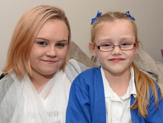 Sisters Jess, 18 and Milly Thompson, seven, pictured, both suffer with Osteogenisis Imperfecta. Picture: Marie Caley NDFP-20-11-18-Thompson-1