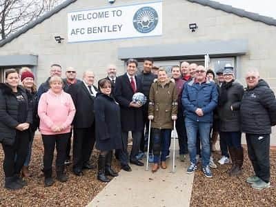 Members of AFC Bentley with MP Ed Miliband and England U21 defender Mason Holgate