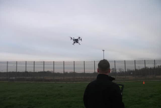 A police drone was used to help search the perimeter fence around HMP Lindholme