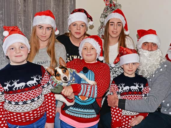 Sam Sides, pictured with her husband Jamie and children, Demi, 15, Nadine, 14, George, ten and twins, Jack and Jake, seven.