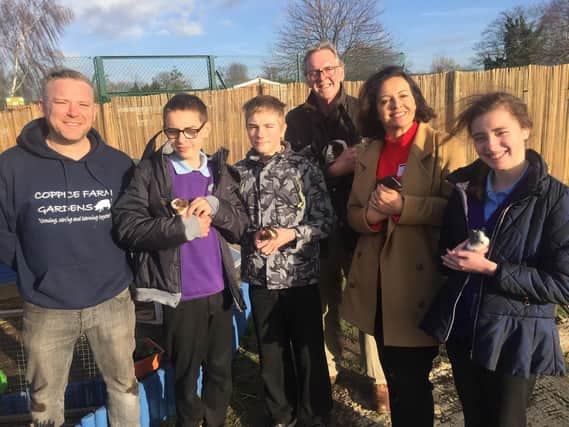 Councillor Derek Smith and MP Caroline Flint (third and second from right) with Coppice School pupils and some guinea pigs at the Doncaster school's farm.