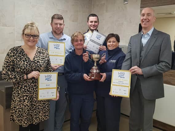 L-R are Lyndsey Parry, deputy centre manager, Kris Brown , regional operations manager, Annie Covell, cleaning operative, Dave Avery, cleaning supervisor, Tina Mchale, cleaning operative, David Aunins, centre manager