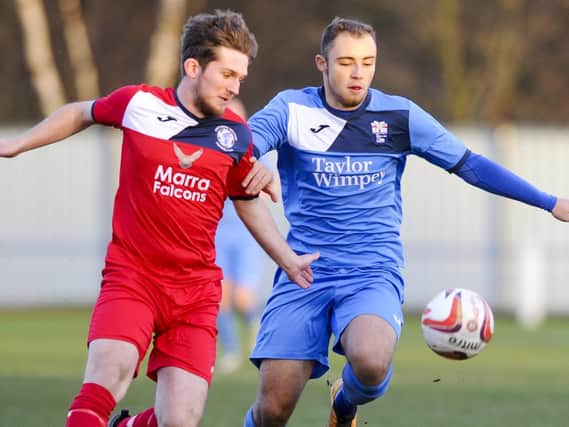 Jordan Buckham, right, scored a late winner for Rossington Main.