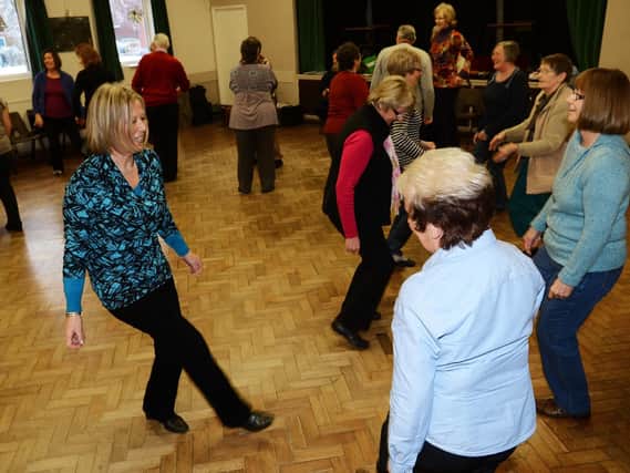 A previous Isle Dance for Health country dancing session at Westwoodside Village Hall, with folk band Lys St Georges.