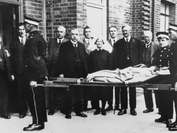 The first patient, A Quigley, enters the new infirmary on Thorne Road. Left to right: Mr W Temperton, Secretary/Superintendent Mr W Smith, Mr A B. Dodds, Chairman Mr A A Bell, Mr A Clarke, Matron Miss M Duesbury, House Surgeon Dr Crossley, Mayor Ald W J Crookes and Vice Chairman Mr E Phillips