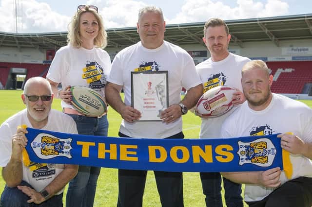 Chris Dungworth (Business Doncaster), Lorna Reeve (visit Doncaster), Carl Hall (Doncaster RLFC), Dean Wiffen (Doncaster council), Ben Lewis (keepmoat stadium) with the Rugby League World Cup bid. PIcture: Dean Atkins