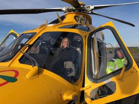 Sarah Withers in the cockpit of the Notts and Lincs Air Ambulance