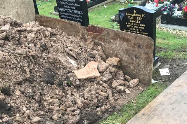 Soil piled on top of Michelle Cook's parents' grave at Redhouse, Cemetery, Doncaster