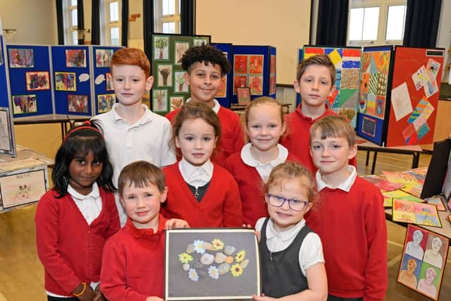 Pupils with their works of art at Bentley High Street Primary School