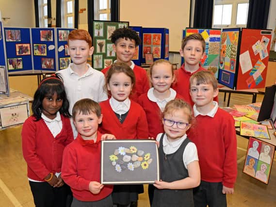 Pupils with their works of art at Bentley High Street Primary School