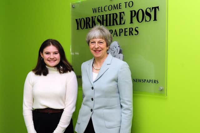 Prime Minister Theresa May with Apprentice Natasha Meek at Yorkshire Post Newspapers in February 2018.