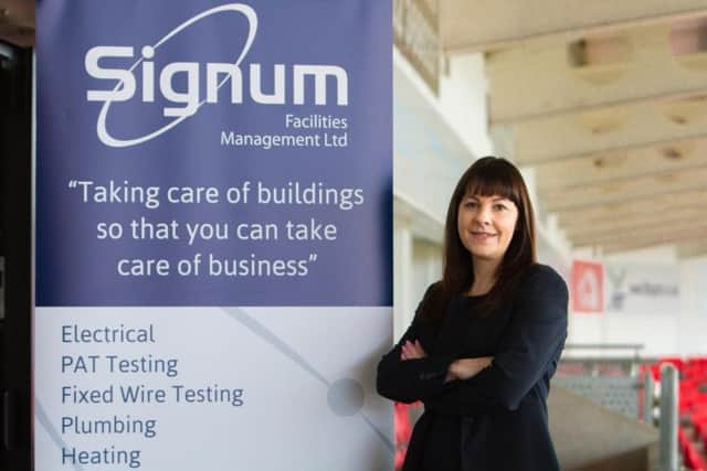 Jill Wood with Signum Sign.