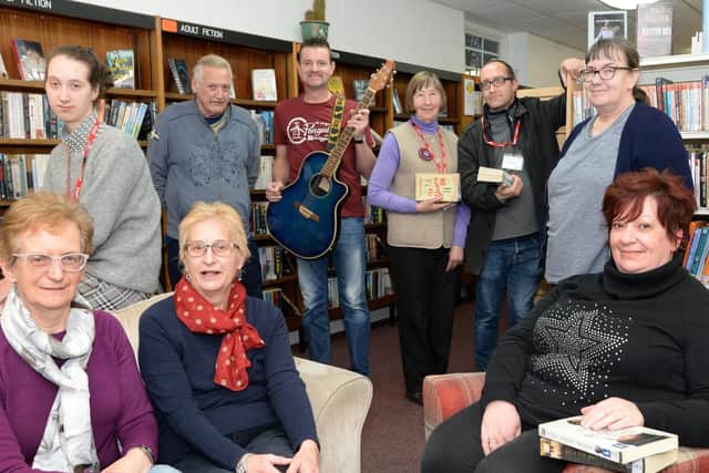 Back l-r Jasmine Connolly, volunteer, Michael Hart, John Rowley, both entertainers, Mary Metcalfe, volunteer, Ashley Ingram, volunteer and Zoe Garnett, volunteer and trustee. Front l-r Gill Carling, Wendy Garnett, both volunteers and trustees and Hayley Royle, manager. Picture: NDFP-29-01-19-29-01-19-AskernLibrary-1