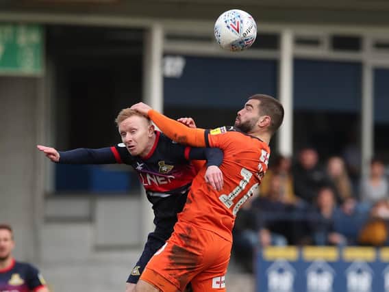 Ali Crawford is wrestled off the ball by Luton's Elliot Lee