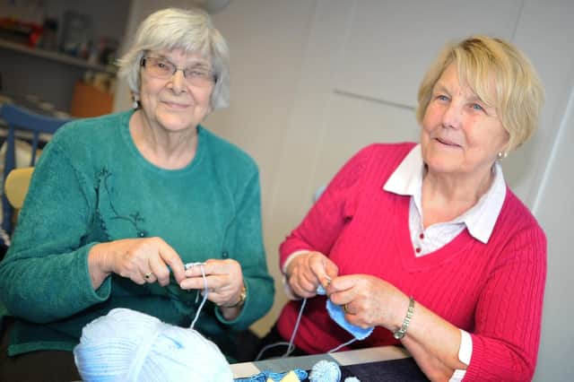 Volunteers Lena Parker and Linda Williamson, pictured are busy Crochet and knitting Tour De Yorkshire themed decorations. Picture: NDFP-26-03-19-Renew-4