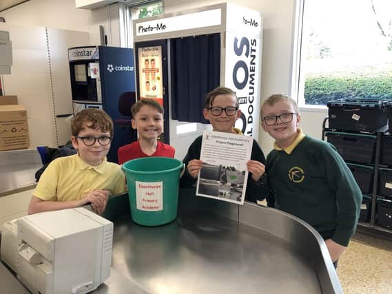 Primary school pupils at Edenthorpe pack bags to raise funds for a play park