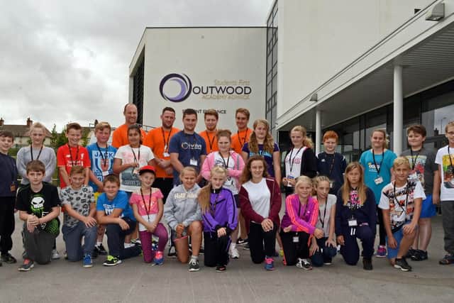 Alex Fraser, Health Monitor, Marvin Reader, Course Leader, Callum Morrow, Jack Halliday and James, Legg, all Health Monitors, pictured with XLR8 participants at Outwood Academy Adwick. Picture: Marie Caley NDFP 10-08-15 XLR8 MC 1