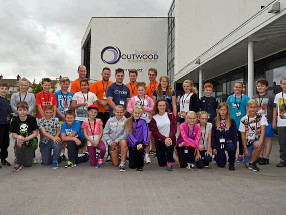 Alex Fraser, Health Monitor, Marvin Reader, Course Leader, Callum Morrow, Jack Halliday and James, Legg, all Health Monitors, pictured with XLR8 participants at Outwood Academy Adwick. Picture: Marie Caley NDFP 10-08-15 XLR8 MC 1