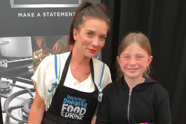 Bake Off winner Candice Brown with 10 year old fan Poppy Pearson at the Doncaster Food Festival