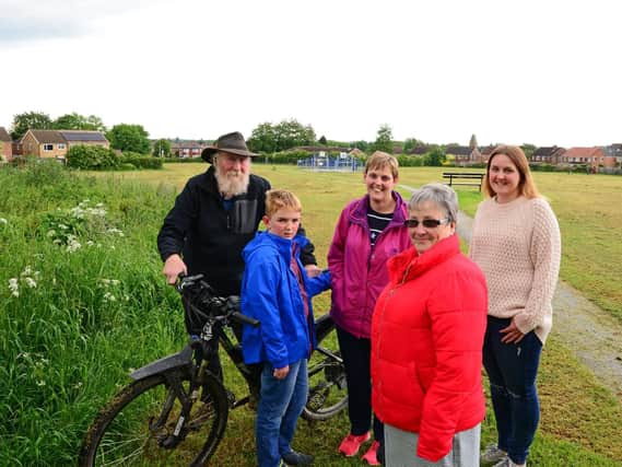 Councillor Jane Nightingale, pictured with l- Mike Gibson, Nathan Annis-Potter, ten, Geraldine Annis-Potter and Emily Monument, pictured at Barnsley Road Playing Field. Picture: Marie Caley NDFP-28-05-19-BarnsleyRdPlayingField-4