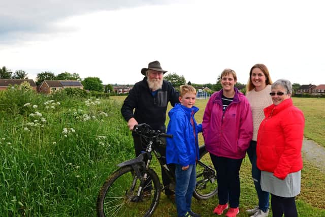 Councillor Jane Nightingale, pictured with l- Mike Gibson, Nathan Annis-Potter, ten, Geraldine Annis-Potter and Emily Monument, pictured at Barnsley Road Playing Field. Picture: Marie Caley NDFP-28-05-19-BarnsleyRdPlayingField-2