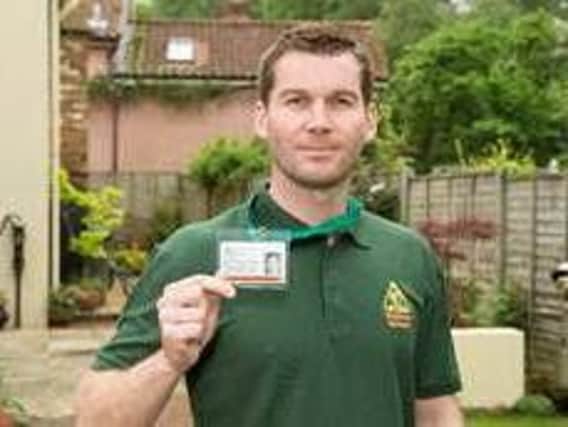 Look for the badge: An OFTEC technician with his ID card