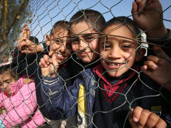 Syrian refugee children. (Photo: PA).
